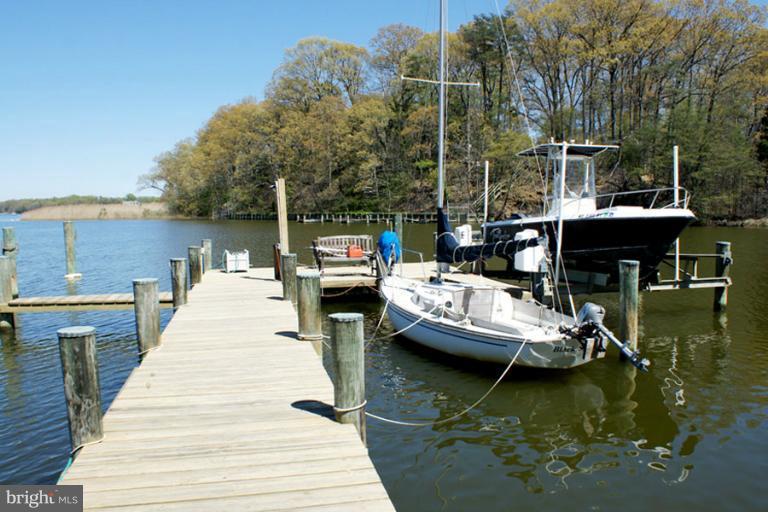 1421 Oak Bluff Road Edgewater, MD 21037 - Photo 3 of 30 a view of boats in a river
