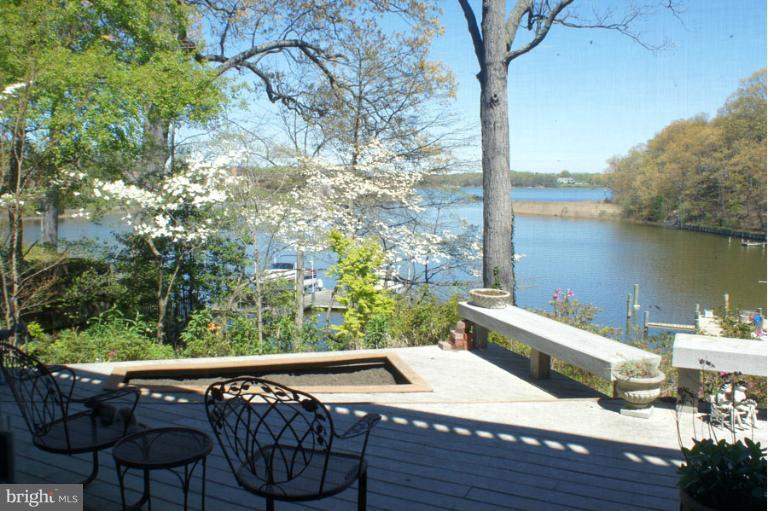 1421 Oak Bluff Road Edgewater, MD 21037 - Photo 28 of 30 a wooden floor with a lake view