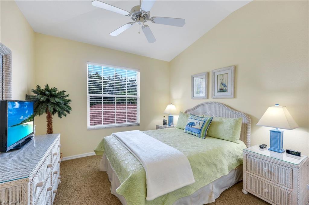 10801 Halfmoon Shoal Road, Unit 202 Estero, FL 34135 - Photo 11 of 45 Guest bedroom features a spacious closet and plenty of natural light.