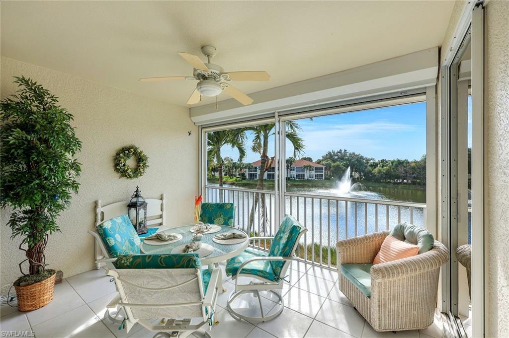 10801 Halfmoon Shoal Road, Unit 202 Estero, FL 34135 - Photo 14 of 45 West facing patio with beautiful view of the fountain and lake.