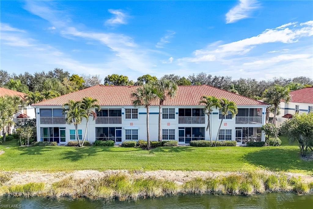 10801 Halfmoon Shoal Road, Unit 202 Estero, FL 34135 - Photo 24 of 45 Aerial rear view of the unit and building