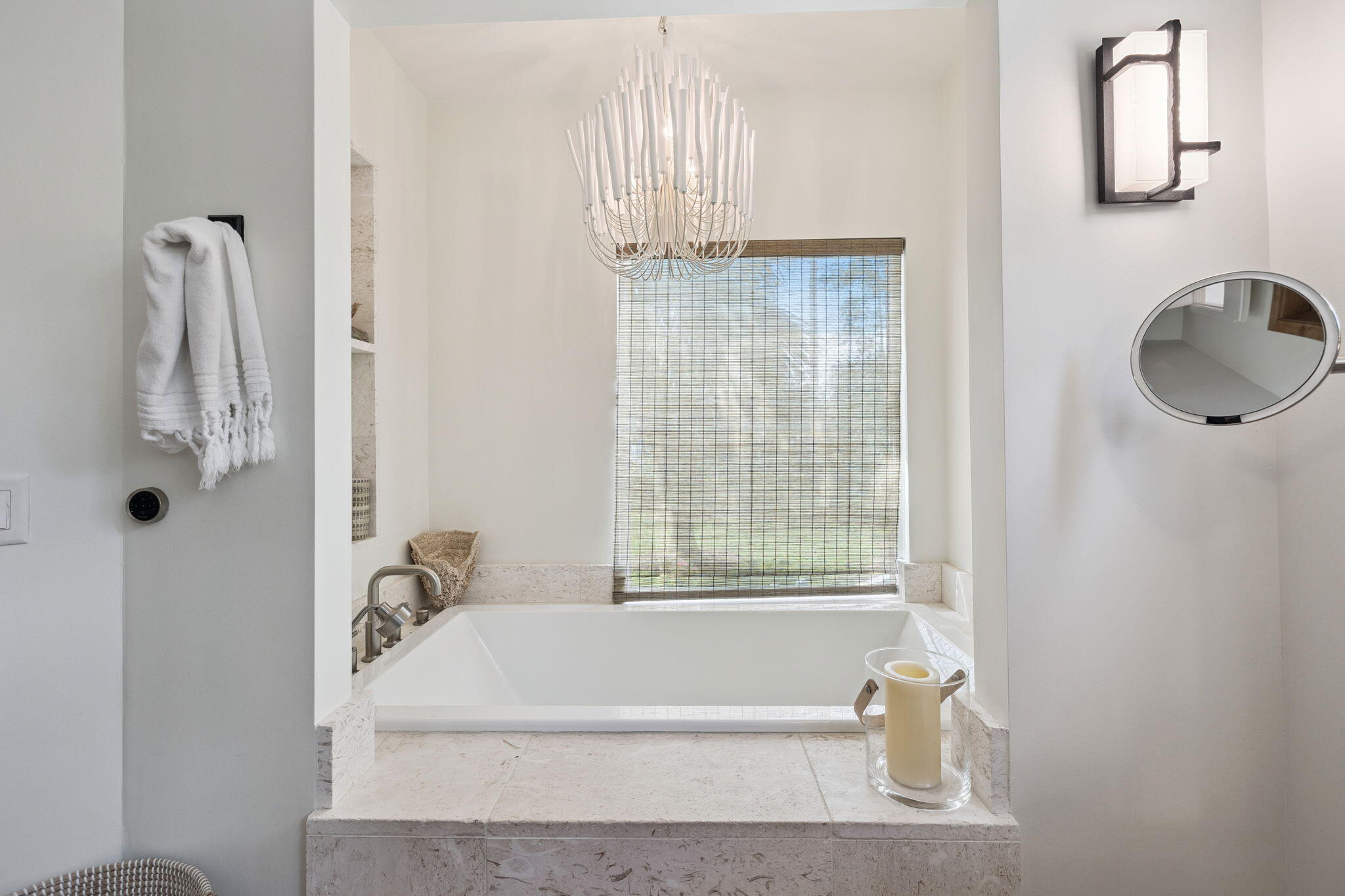 683 Eden Drive Santa Rosa Beach, FL 32459 - Photo 41 of 69 a bathroom with a tub a window and a shower