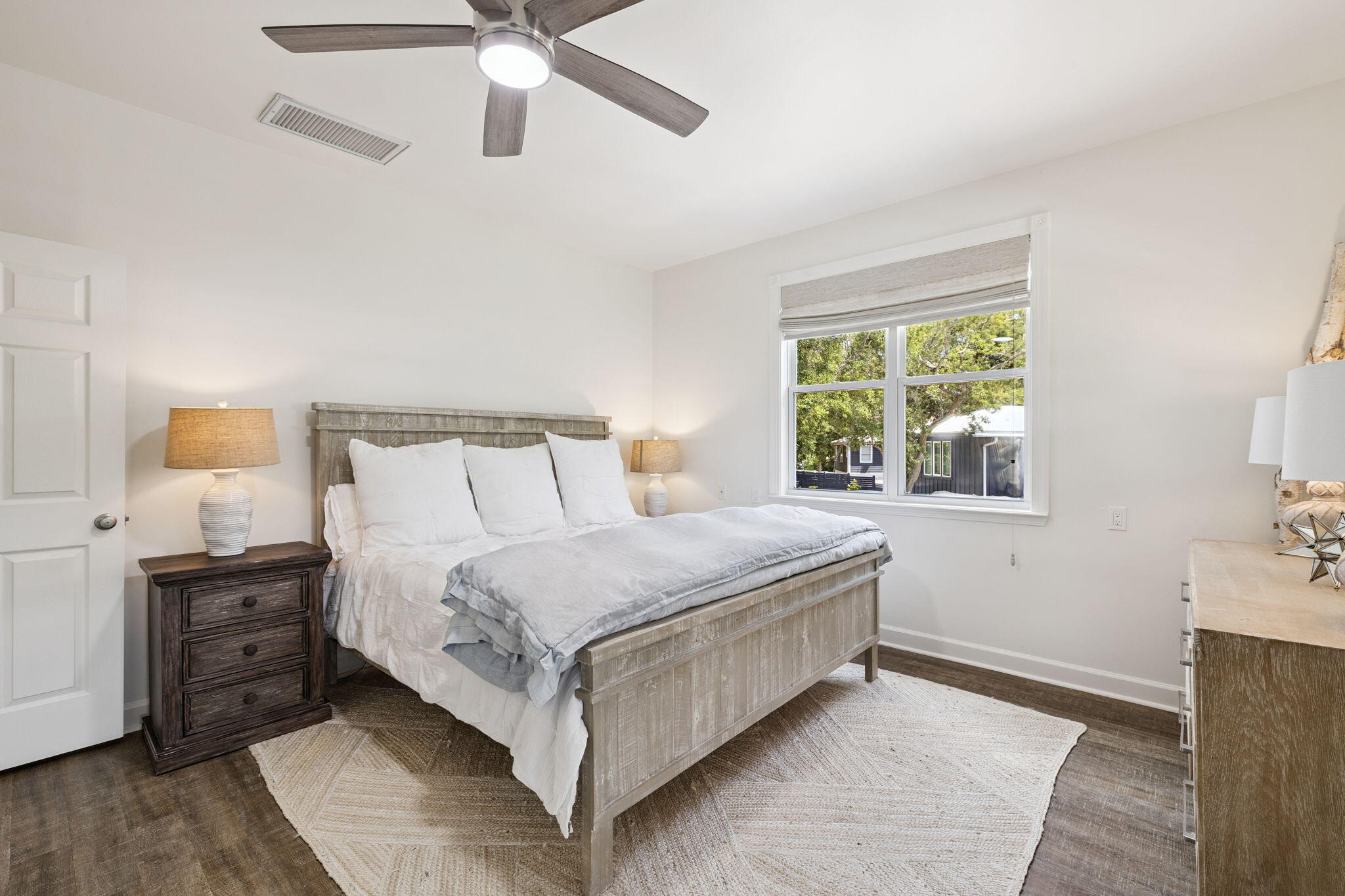 683 Eden Drive Santa Rosa Beach, FL 32459 - Photo 59 of 69 a bedroom with a bed and window