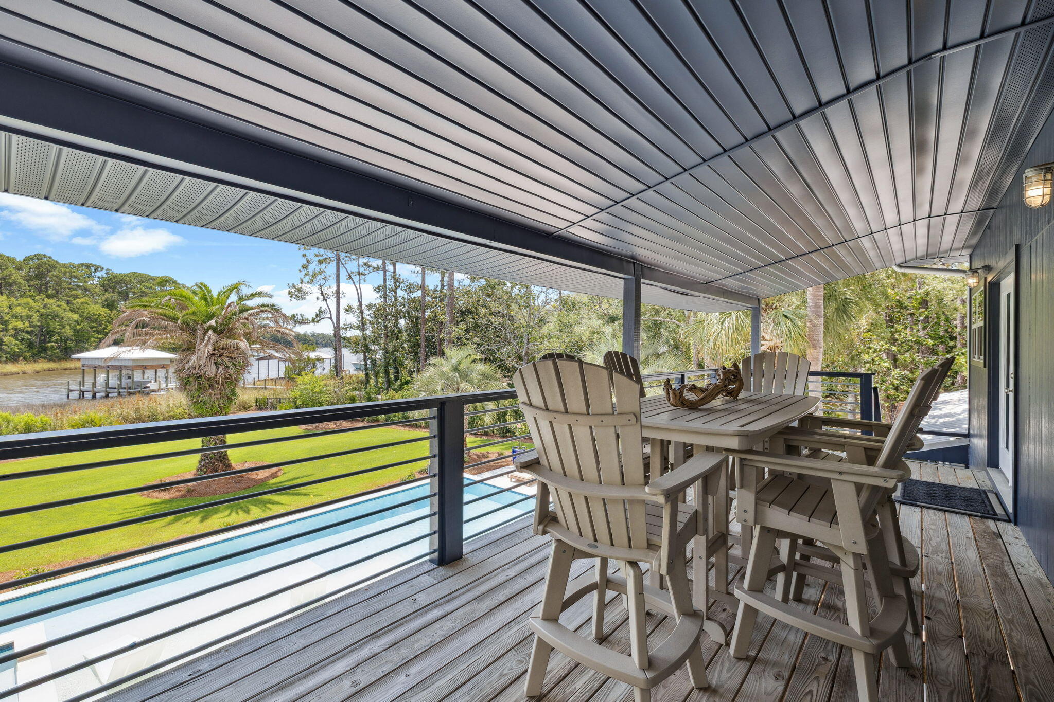 683 Eden Drive Santa Rosa Beach, FL 32459 - Photo 61 of 69 a view of a dining room with furniture window and outside view