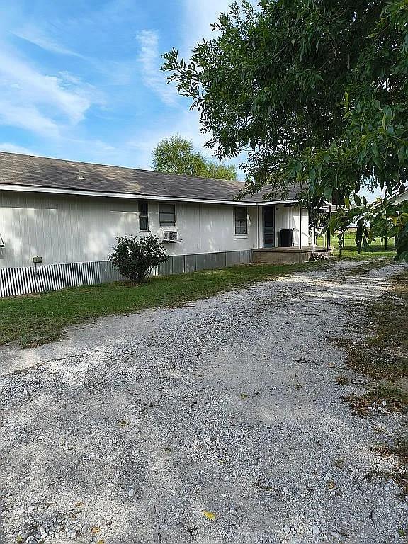 1250 Winn Road Bowie, TX 76230 - Photo 11 of 40 a view of a out door space area