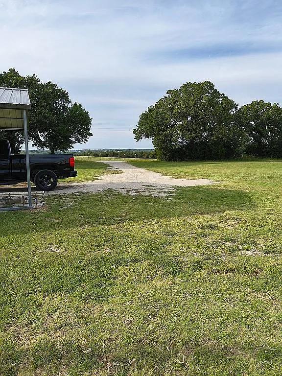 1250 Winn Road Bowie, TX 76230 - Photo 12 of 40 a view of a field with an ocean
