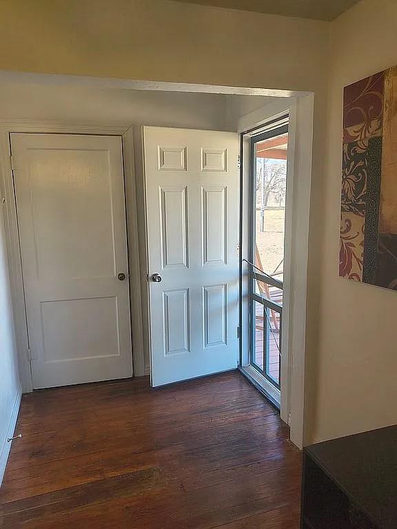 1250 Winn Road Bowie, TX 76230 - Photo 13 of 40 an empty room with windows