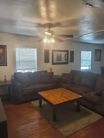 a view of a workspace with furniture