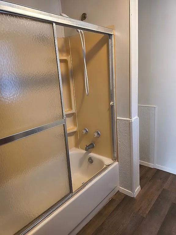 1250 Winn Road Bowie, TX 76230 - Photo 34 of 40 a bathroom with a bathtub and a shower