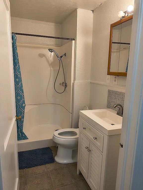 1250 Winn Road Bowie, TX 76230 - Photo 38 of 40 a bathroom with a sink a toilet and shower