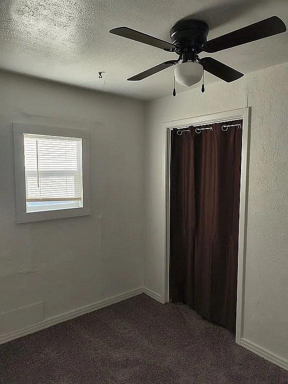 1250 Winn Road Bowie, TX 76230 - Photo 40 of 40 an empty room with a ceiling fan and a window