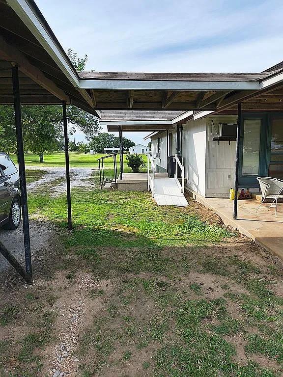 1250 Winn Road Bowie, TX 76230 - Photo 8 of 40 a view of a backyard