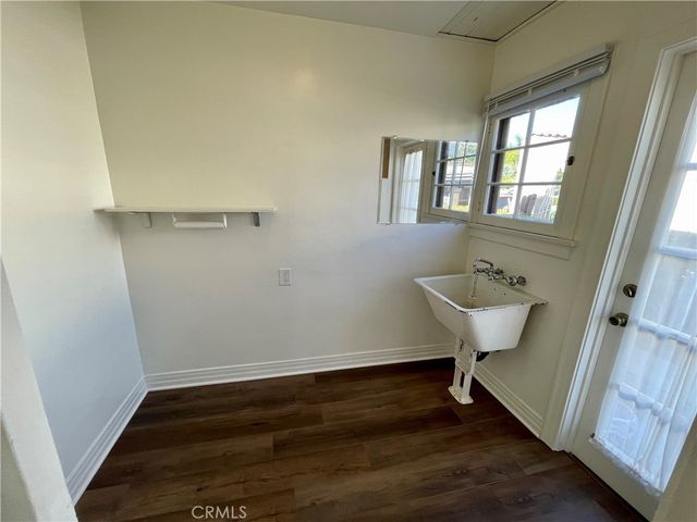 a bathroom with a sink and mirror