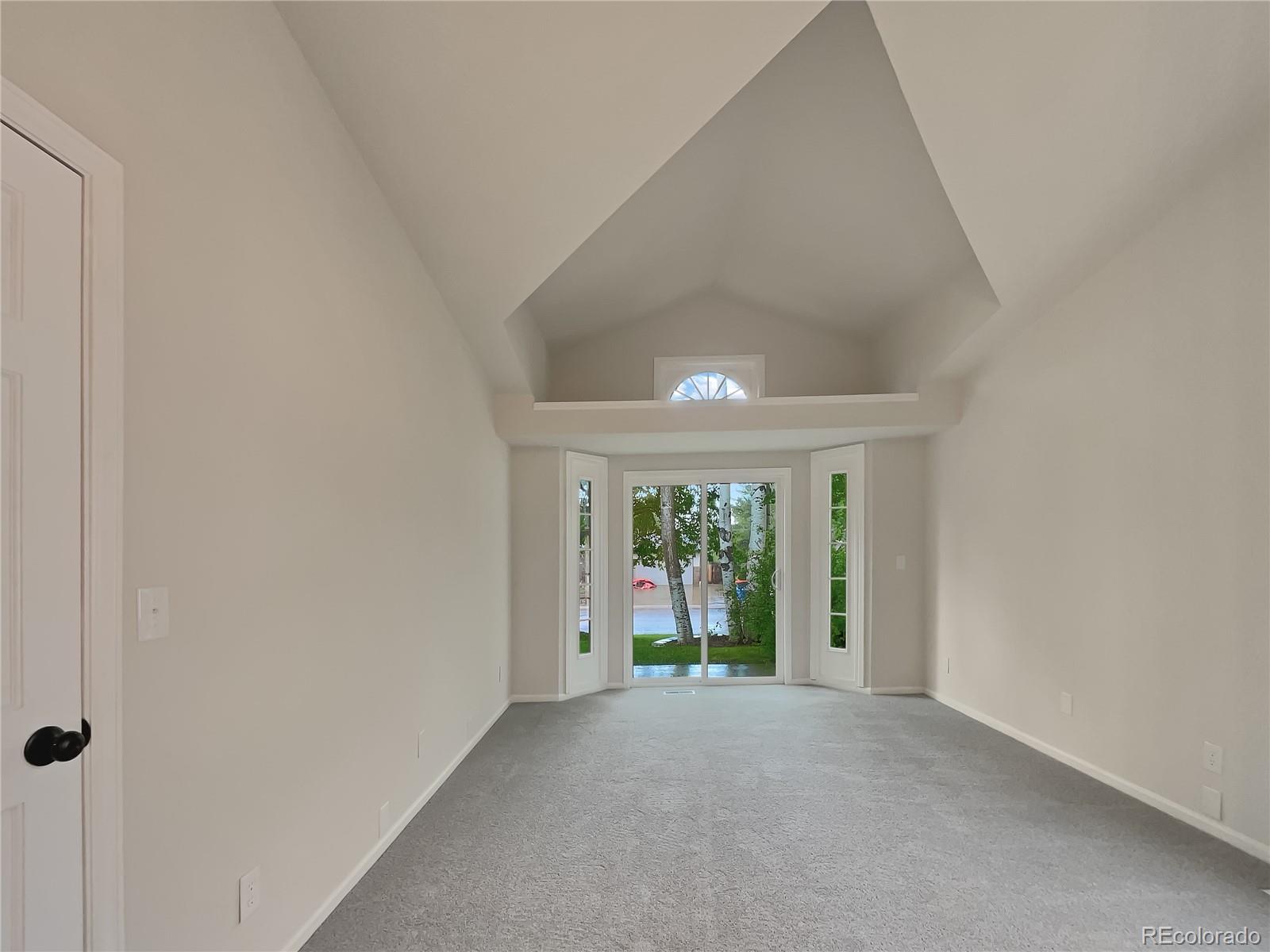 14 Maple Drive Frederick, CO 80530 - Photo 16 of 20 a view of an empty room with a window