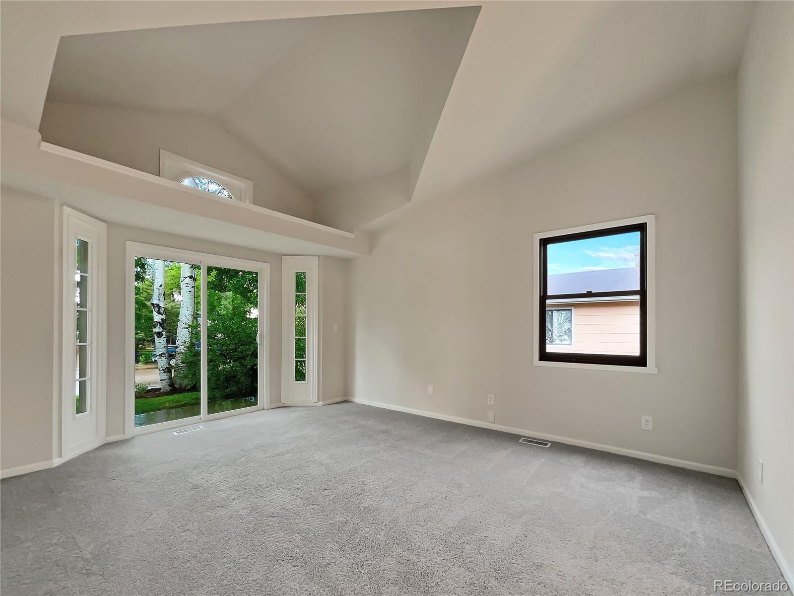 14 Maple Drive Frederick, CO 80530 - Photo 17 of 20 a view of an empty room with a window
