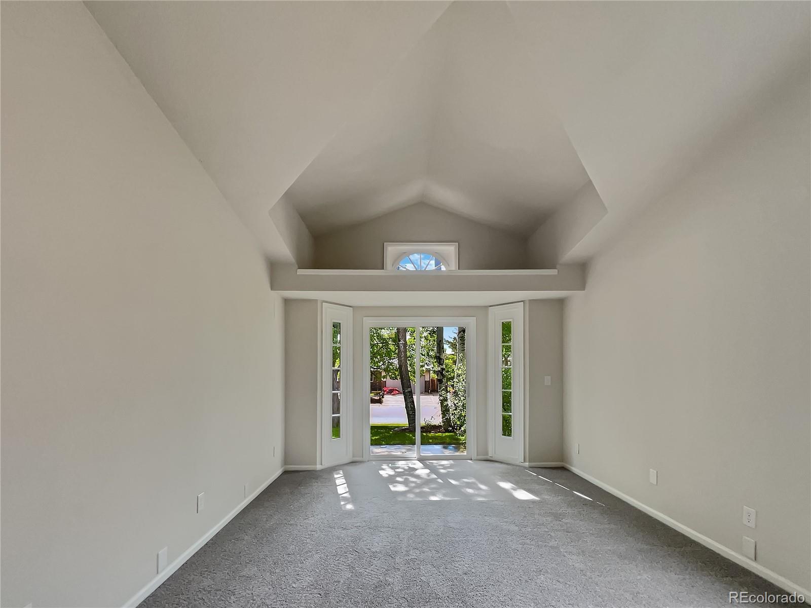 14 Maple Drive Frederick, CO 80530 - Photo 20 of 20 a view of an empty room with windows