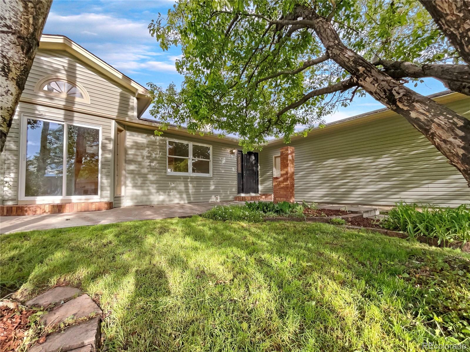14 Maple Drive Frederick, CO 80530 - Photo 7 of 20 a view of a house with a yard