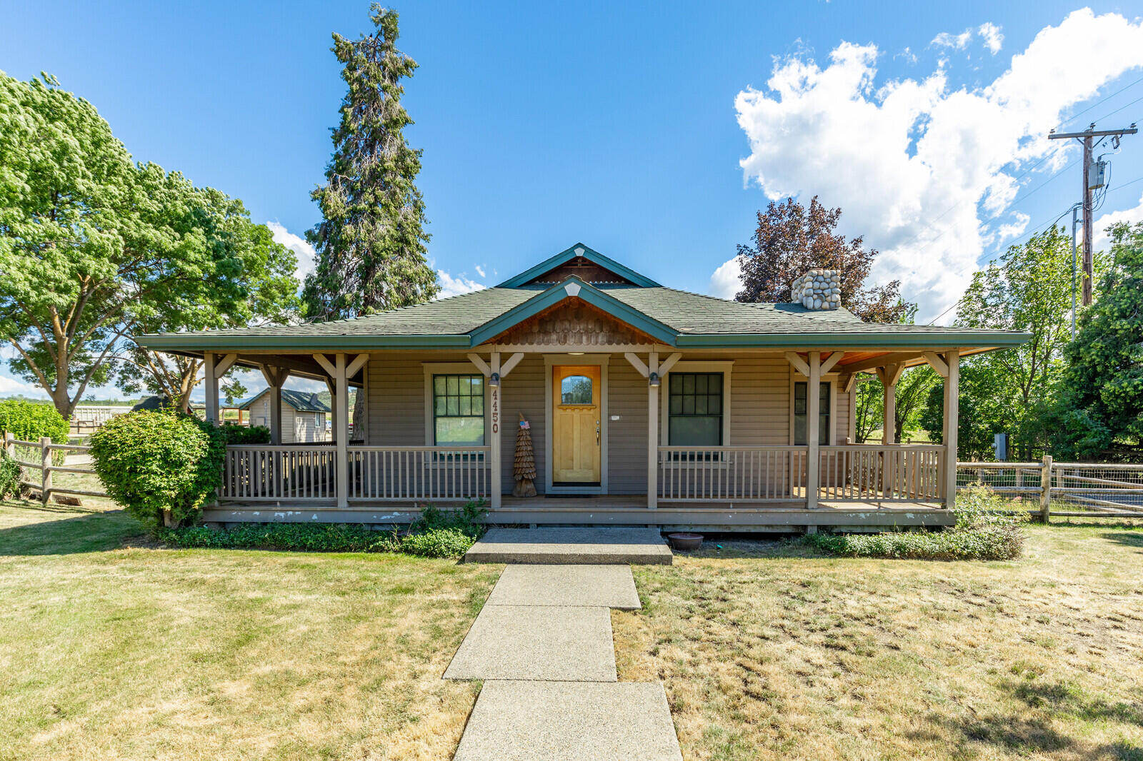 4450 Fern Valley Road Medford, OR 97504 - Photo 36 of 74 a front view of a house with garden