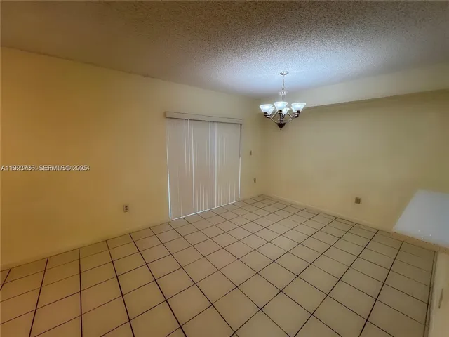 a kitchen with stainless steel appliances a sink dishwasher stove and cabinets