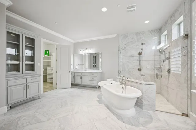 a bathroom with a bathtub sink and toilet