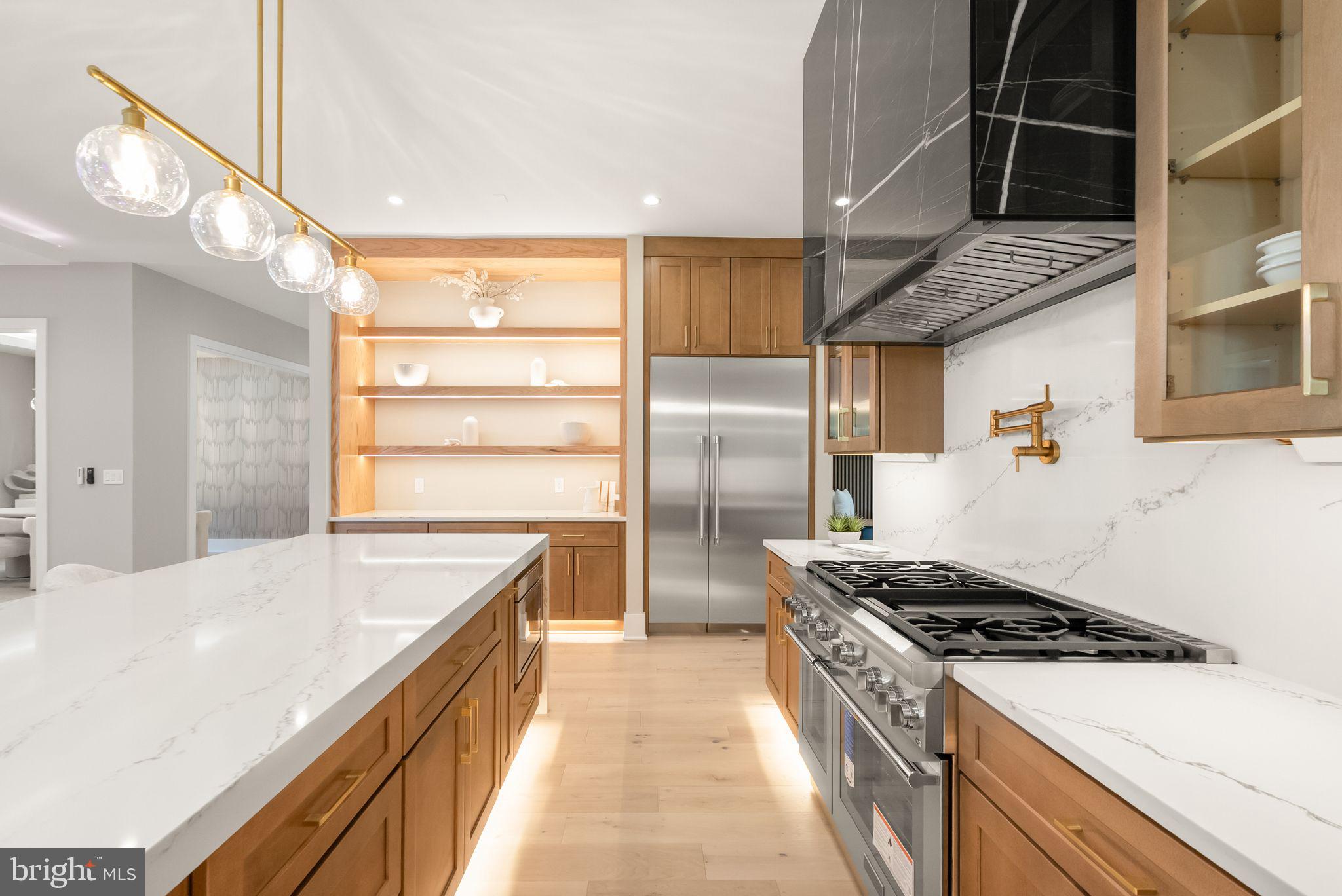 6329 Halsey Road McLean, VA 22101 - Photo 23 of 94 Sleek modern kitchen with elegant finishes.