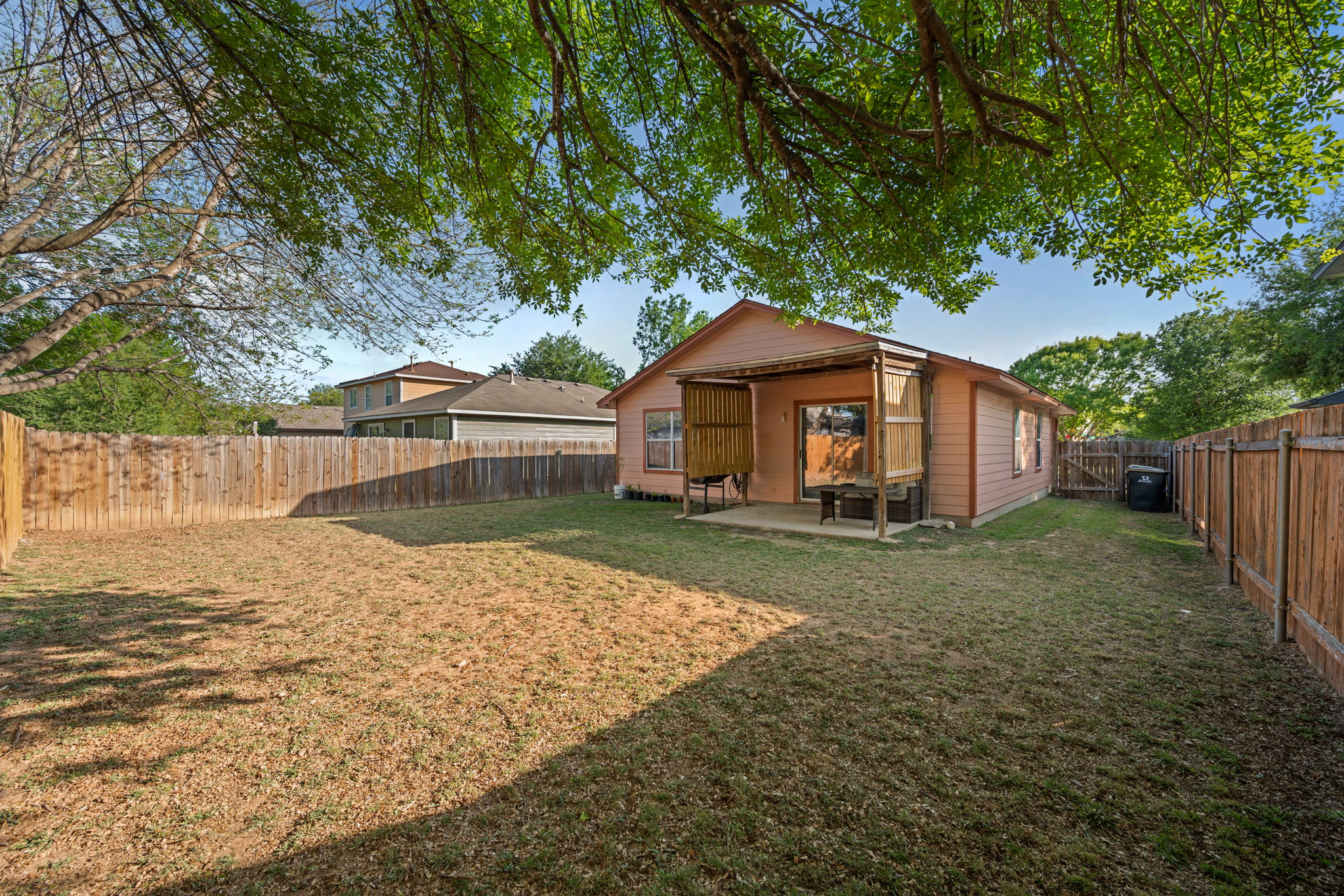 14206 Varrelman Street Austin, TX 78725 - Photo 24 of 27 a view of a house with a yard