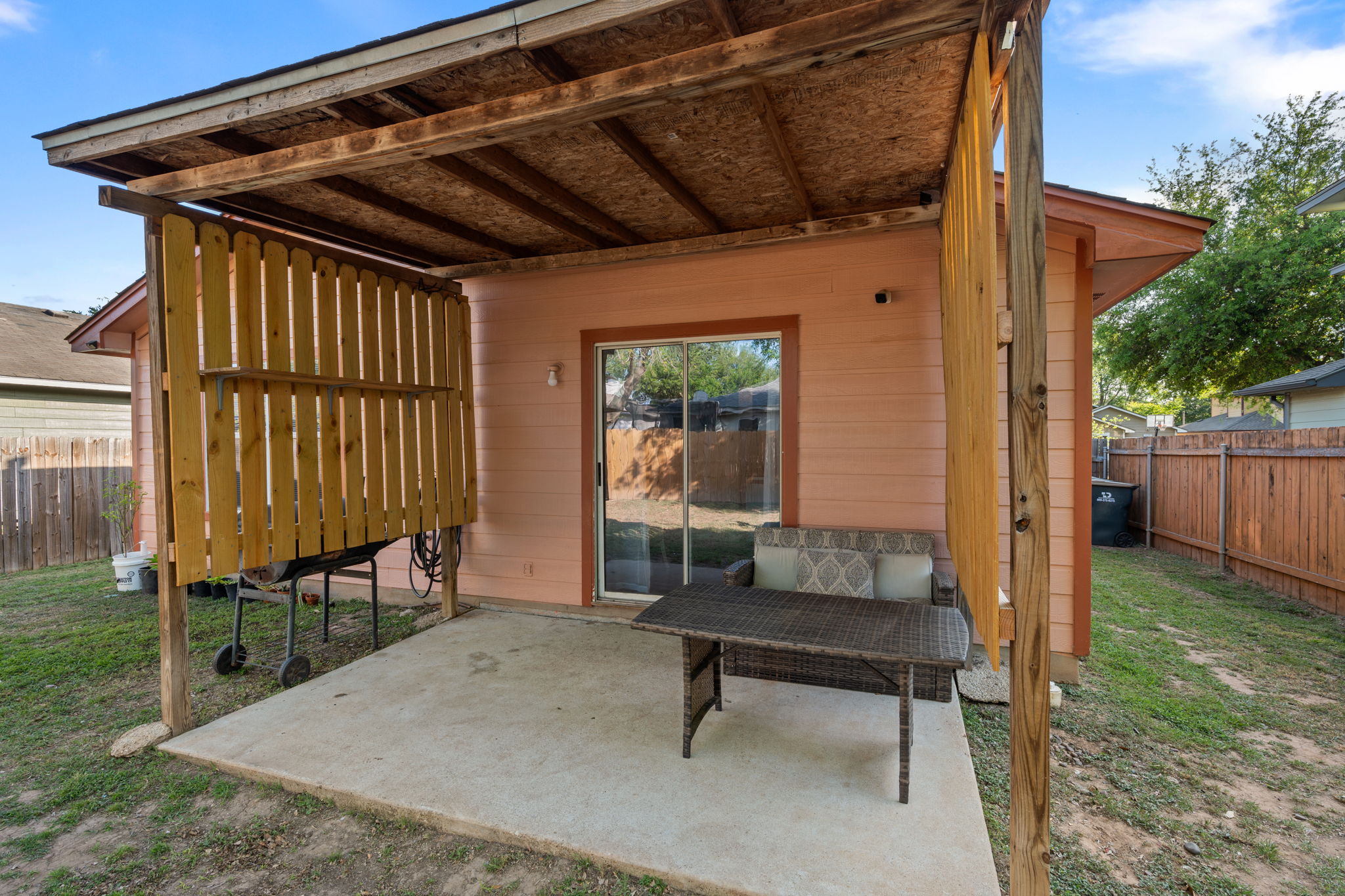 14206 Varrelman Street Austin, TX 78725 - Photo 25 of 27 a patio with table and chairs