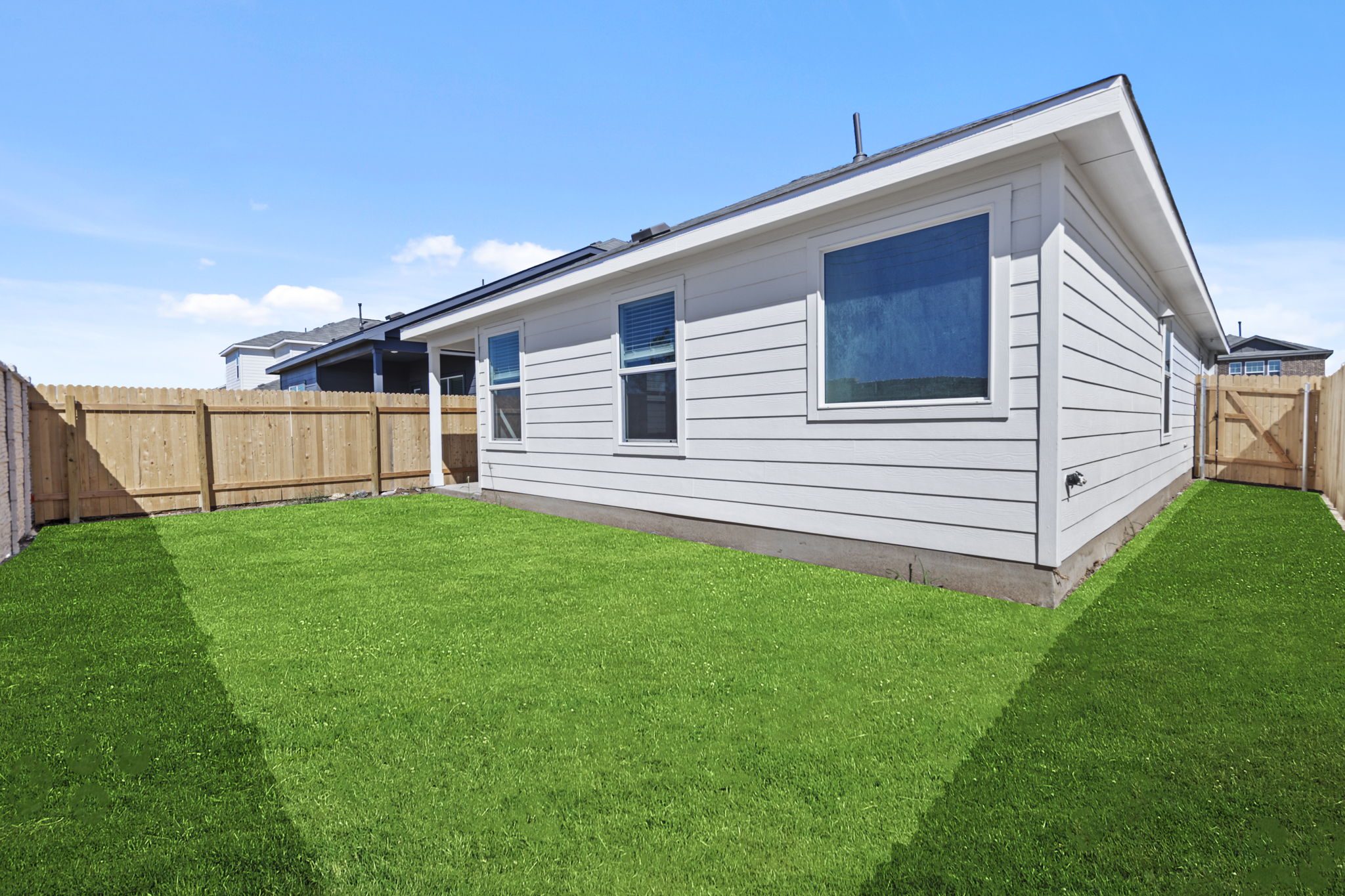 945 Soapstone Pass Maxwell, TX 78656 - Photo 4 of 19 a view of a backyard with plants and a garden