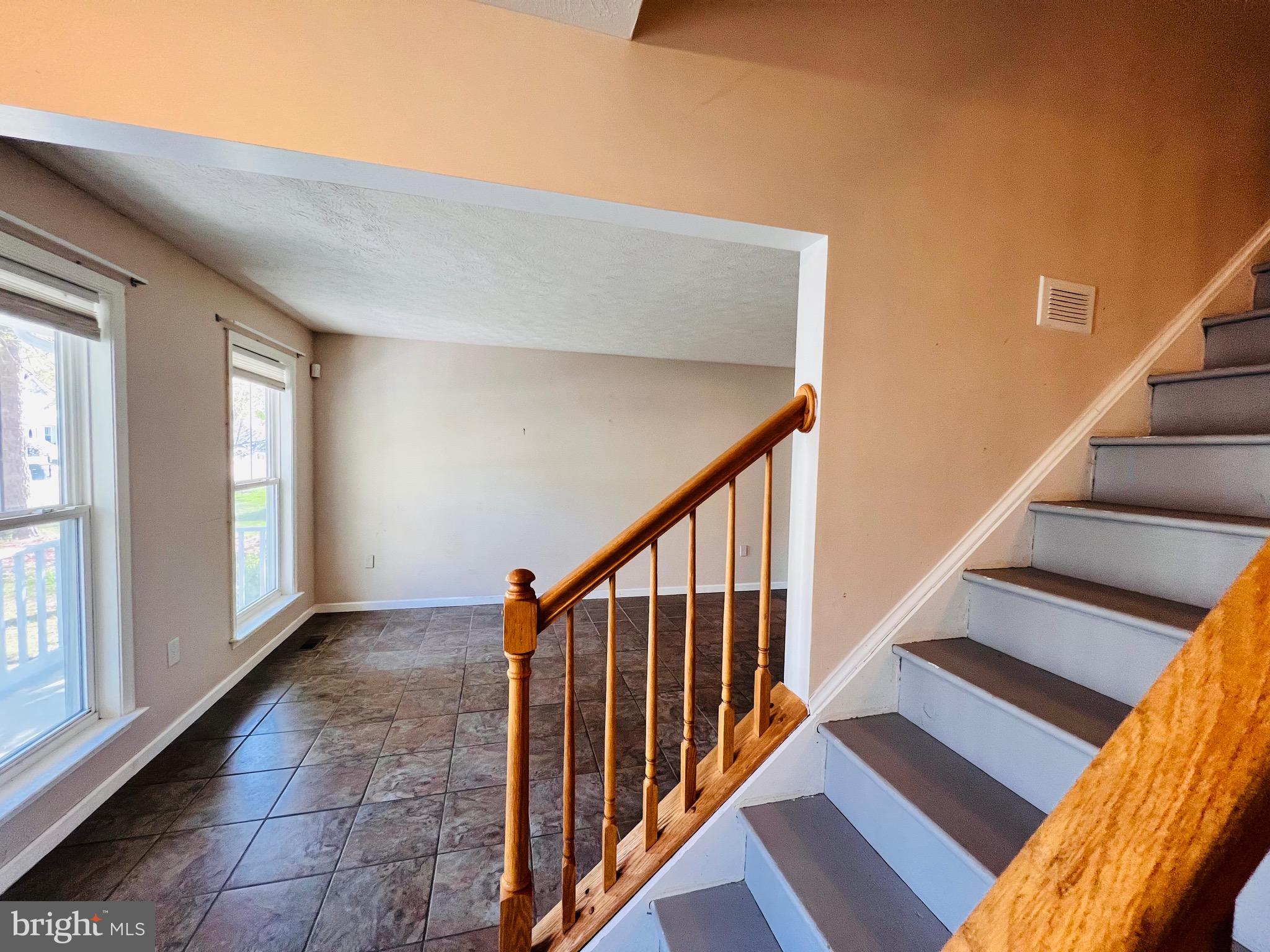 213 Forest Avenue Colonial Beach, VA 22443 - Photo 22 of 54 a view of an entryway with staircase