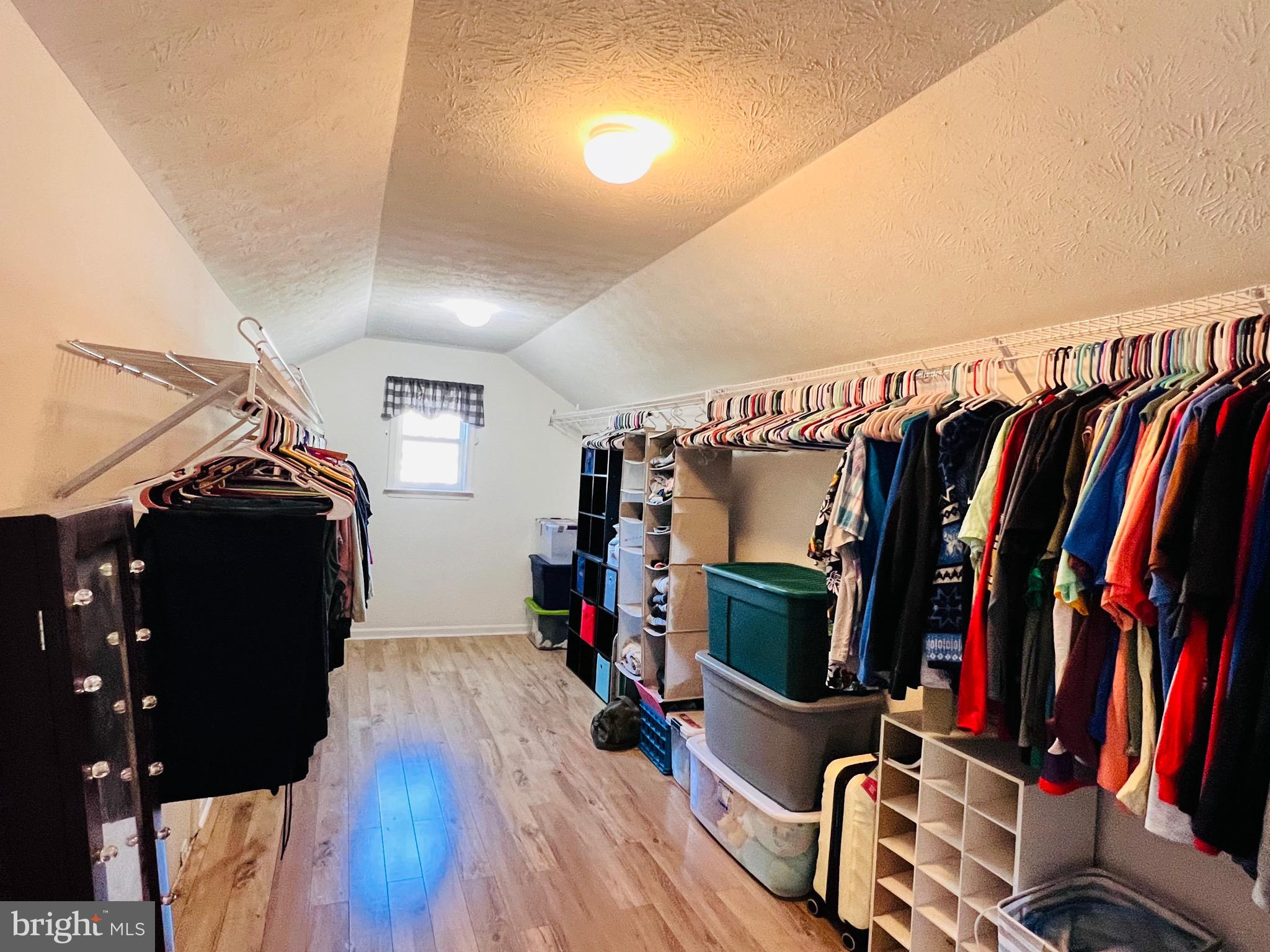 213 Forest Avenue Colonial Beach, VA 22443 - Photo 42 of 54 a view of walk in closet with clothes and shoes