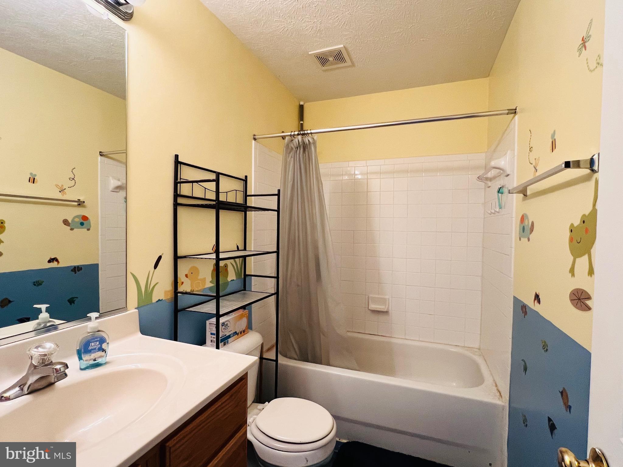 213 Forest Avenue Colonial Beach, VA 22443 - Photo 49 of 54 a bathroom with a sink toilet tub and shower