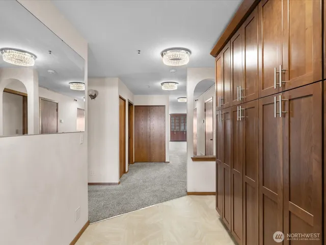 an empty room with wooden floor