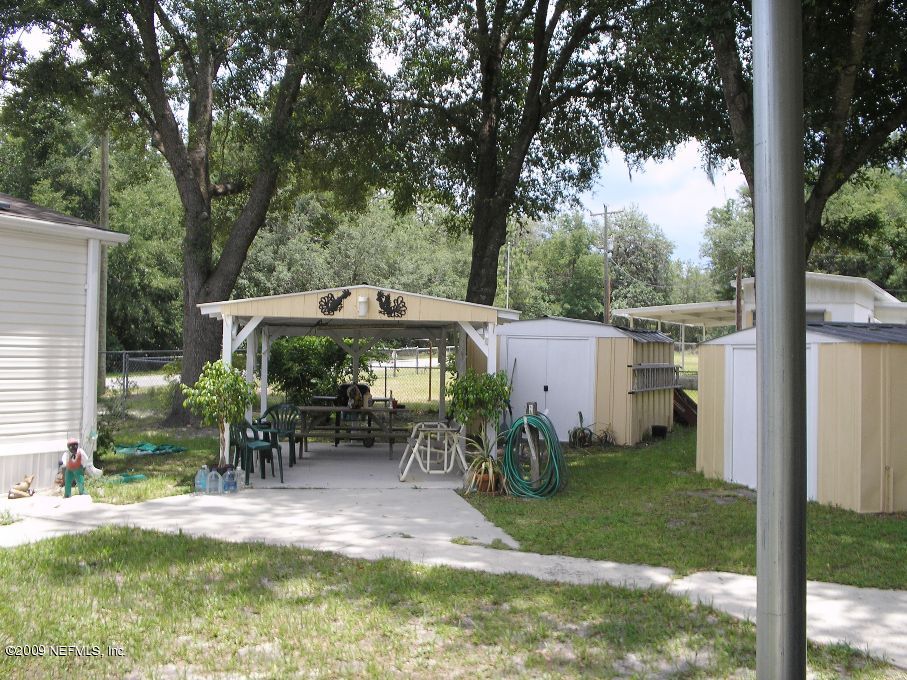 covered patio & storage bldgs