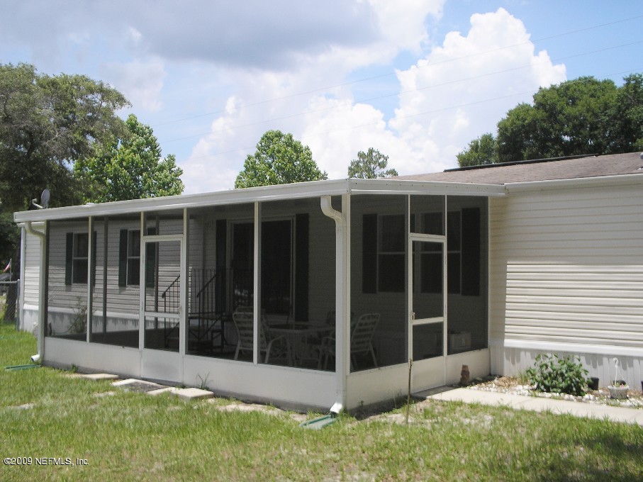 100 Hillcrest Road Satsuma, FL 32189 - Photo 8 of 13 screened porch