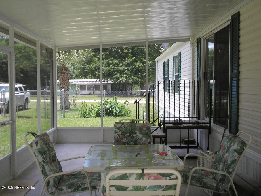 100 Hillcrest Road Satsuma, FL 32189 - Photo 9 of 13 screened porch