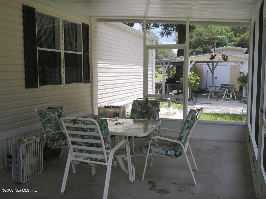 100 Hillcrest Road Satsuma, FL 32189 - Photo 10 of 13 screened porch