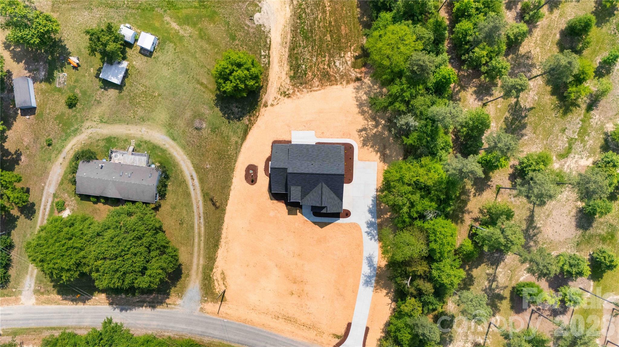 352 Adams Road Clover, SC 29710 - Photo 37 of 38 an aerial view of a house with a yard basket ball court