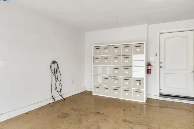 a view of backyard with small cabin