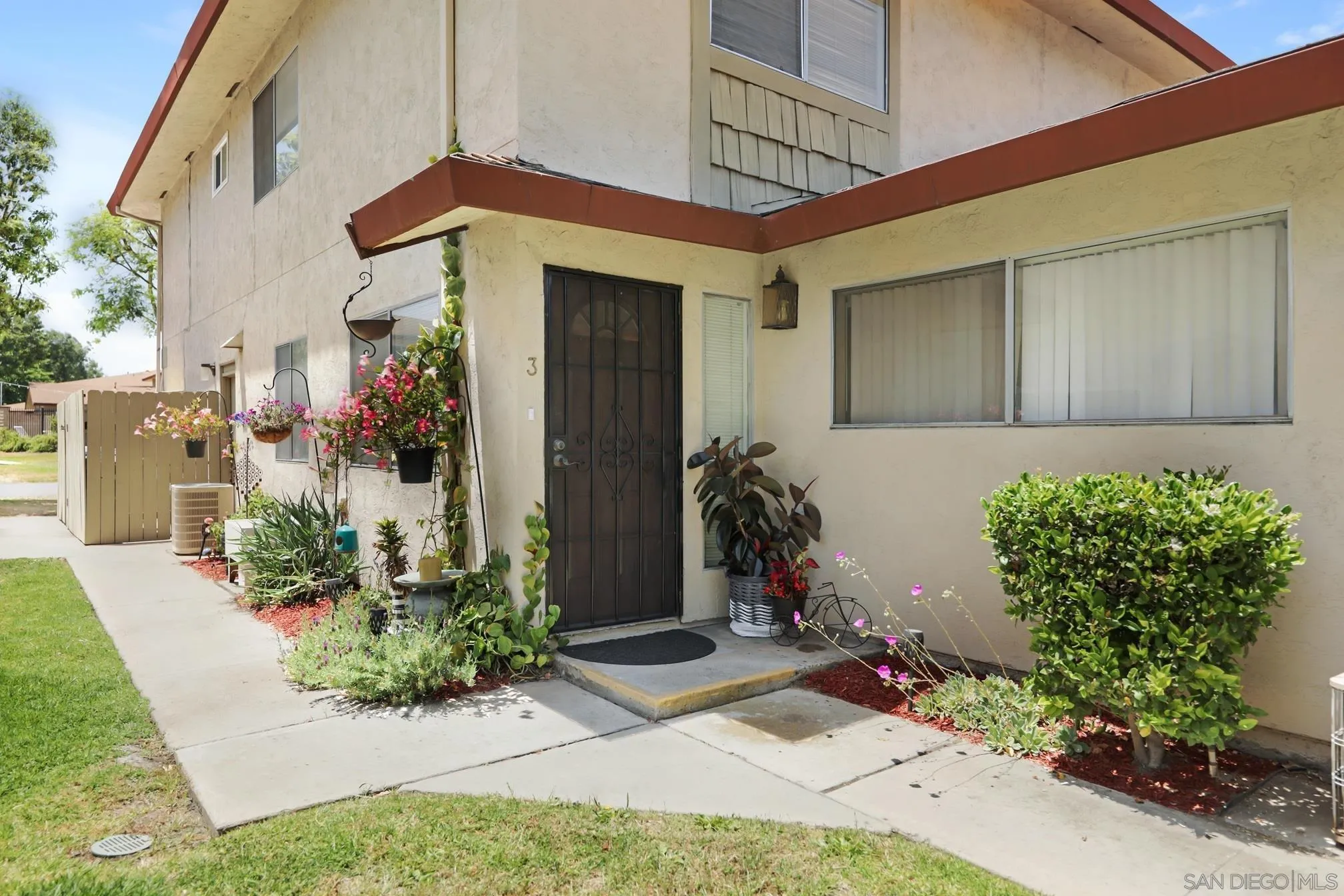 9845 Mission Gorge Road, Unit 3 Santee, CA 92071 - Photo 3 of 25 a front view of a house