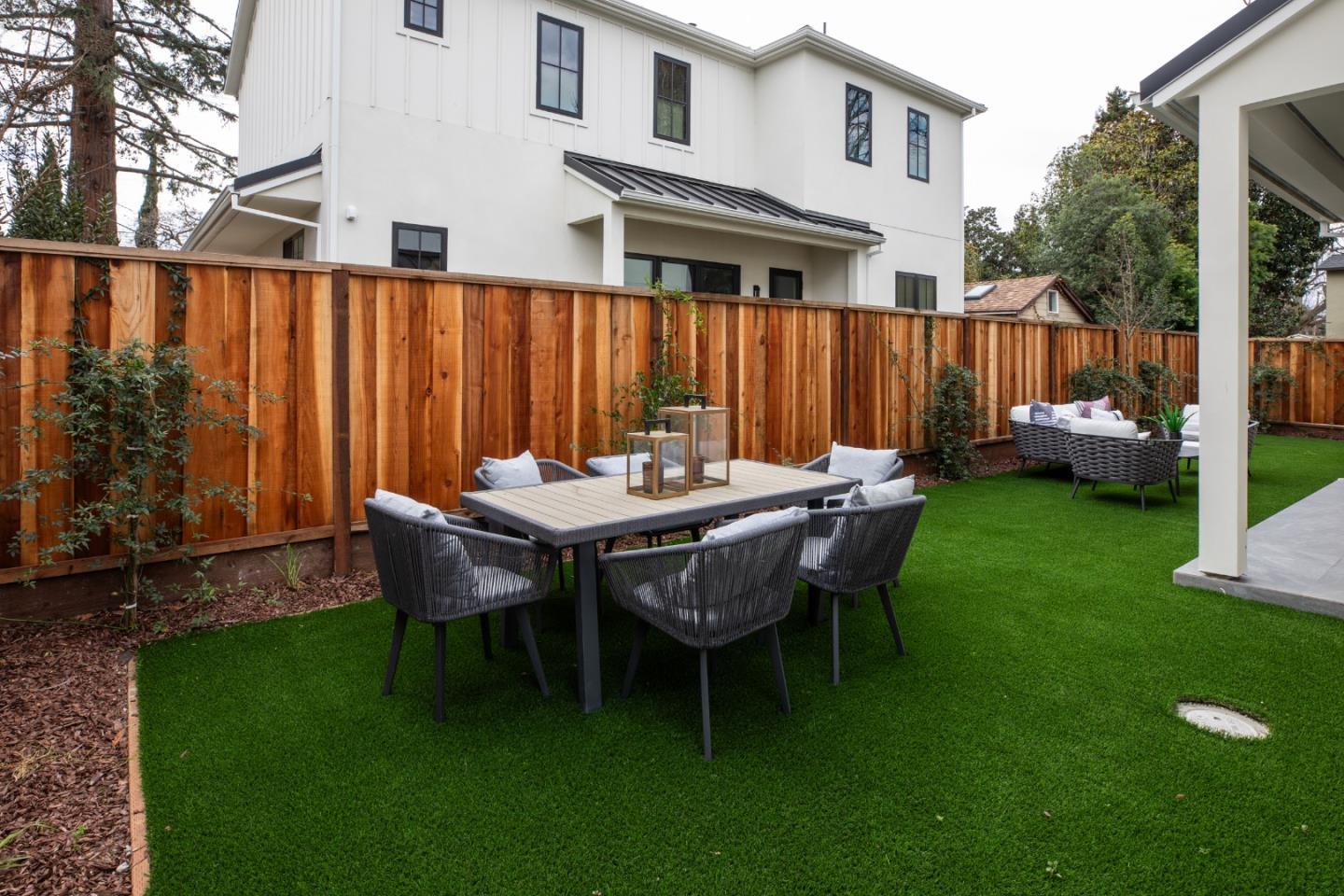 813 Bay Road Menlo Park, CA 94025 - Photo 19 of 23 a backyard of a house with table and chairs