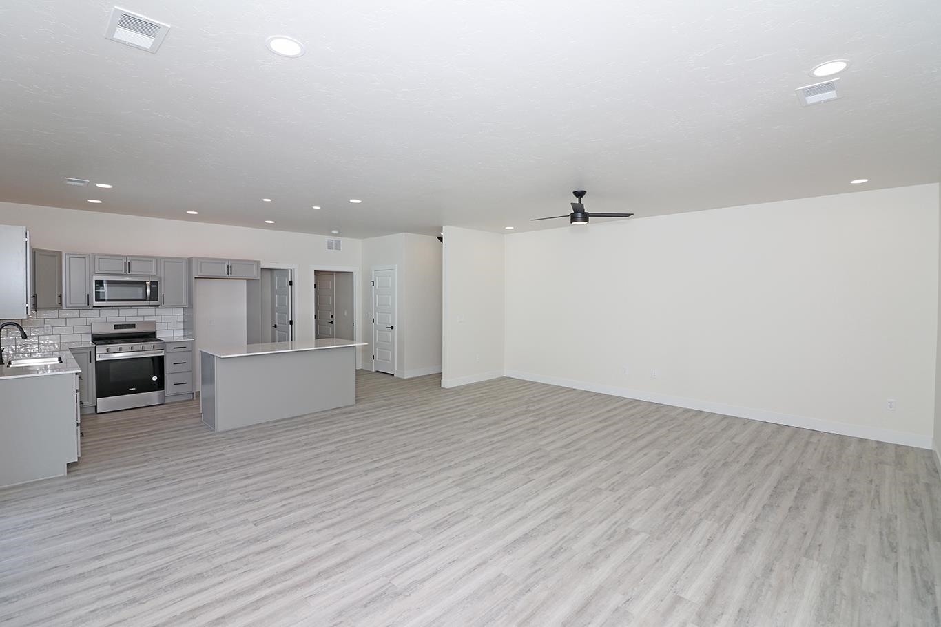 2450 Hamilton Road, Unit B Grand Junction, CO 81505 - Photo 11 of 29 a view of a kitchen with microwave and cabinets