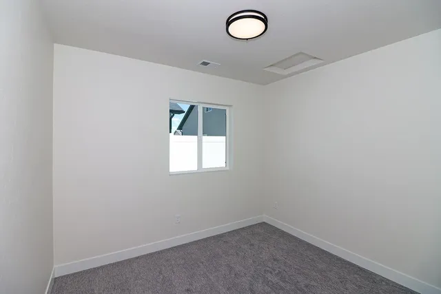 a bathroom with a toilet and a bathtub