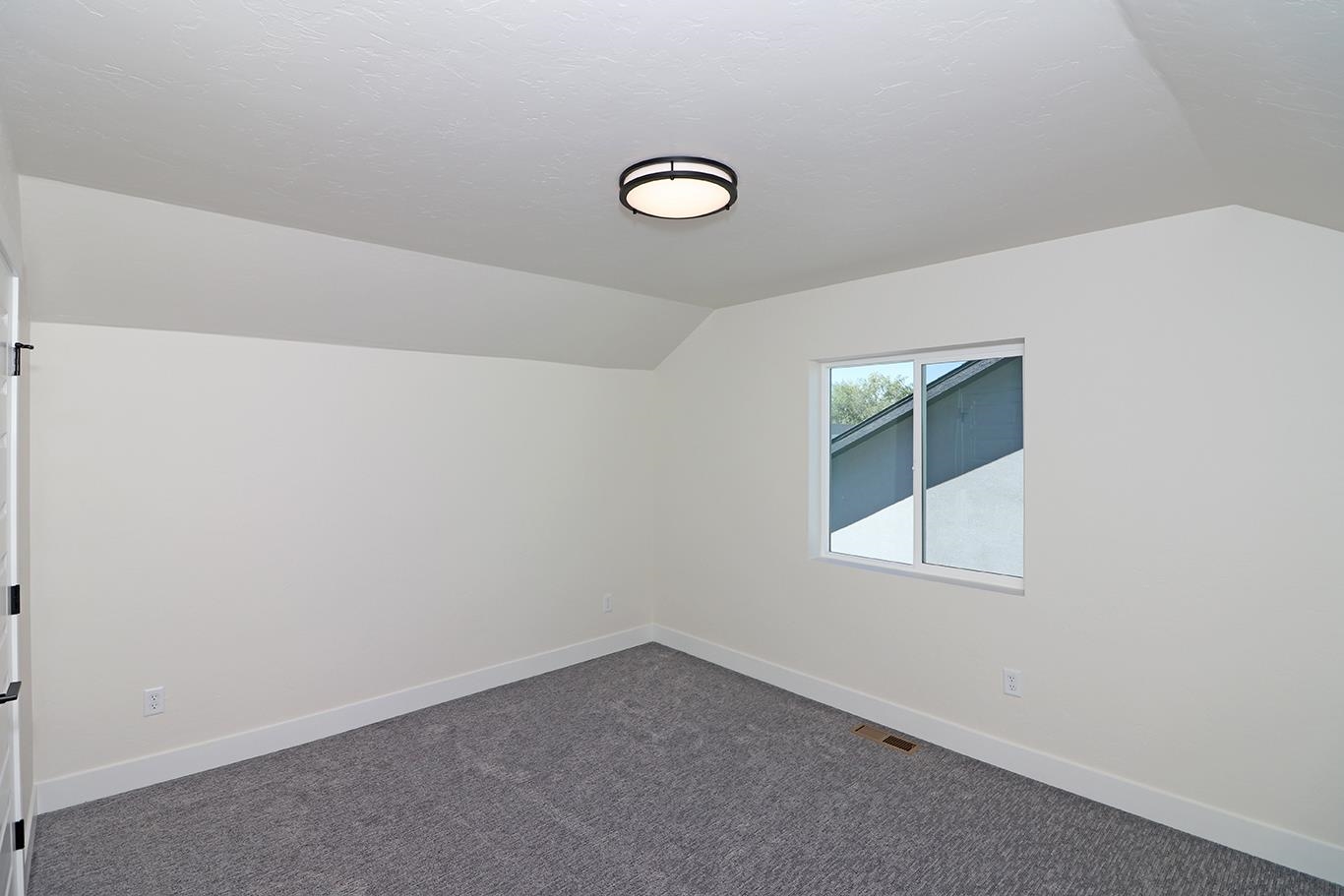 2450 Hamilton Road, Unit B Grand Junction, CO 81505 - Photo 17 of 29 an empty room with a window