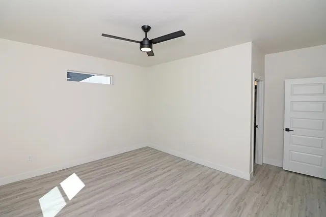 a bathroom with a sink vanity and a mirror