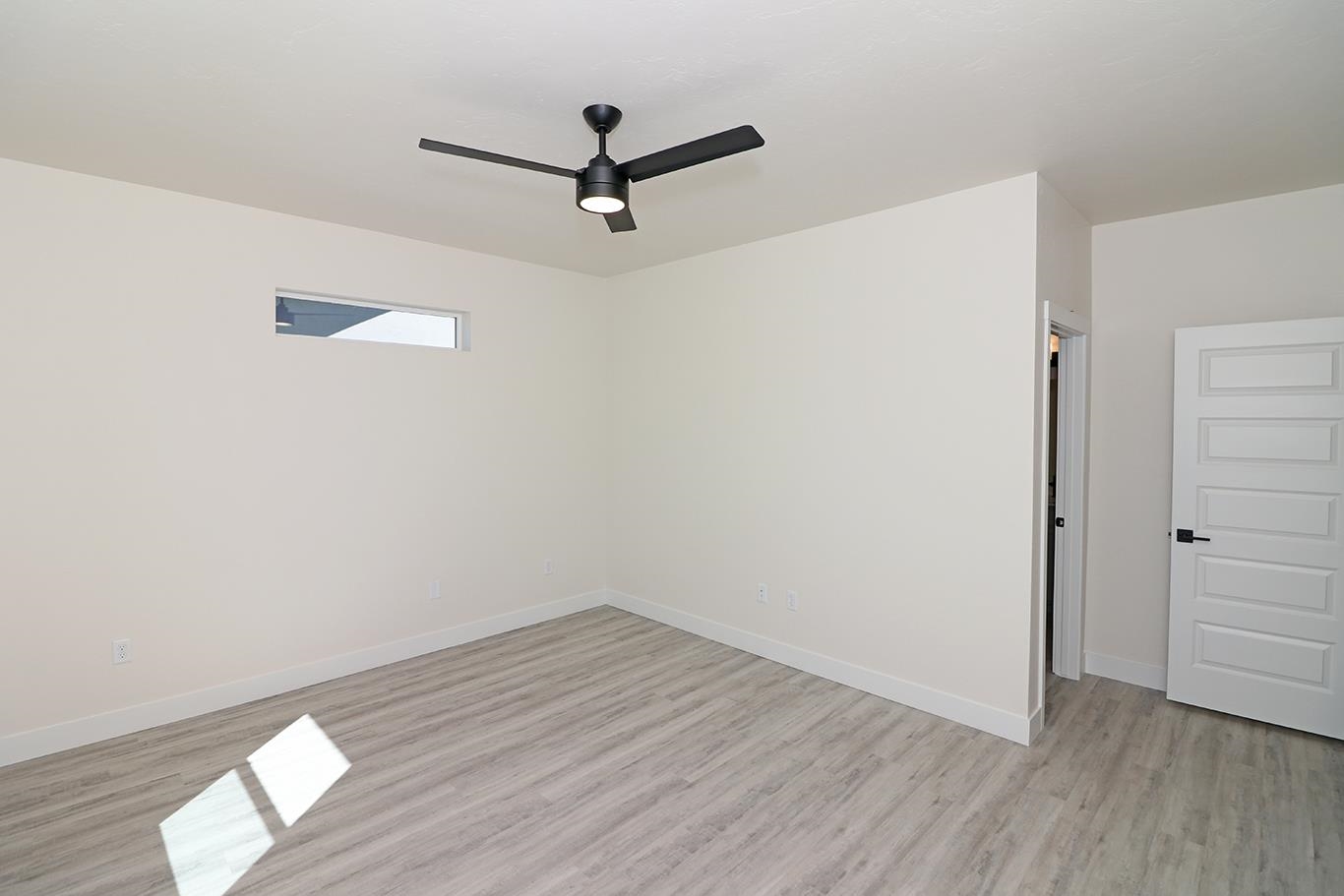 2450 Hamilton Road, Unit B Grand Junction, CO 81505 - Photo 21 of 29 wooden floor in an empty room