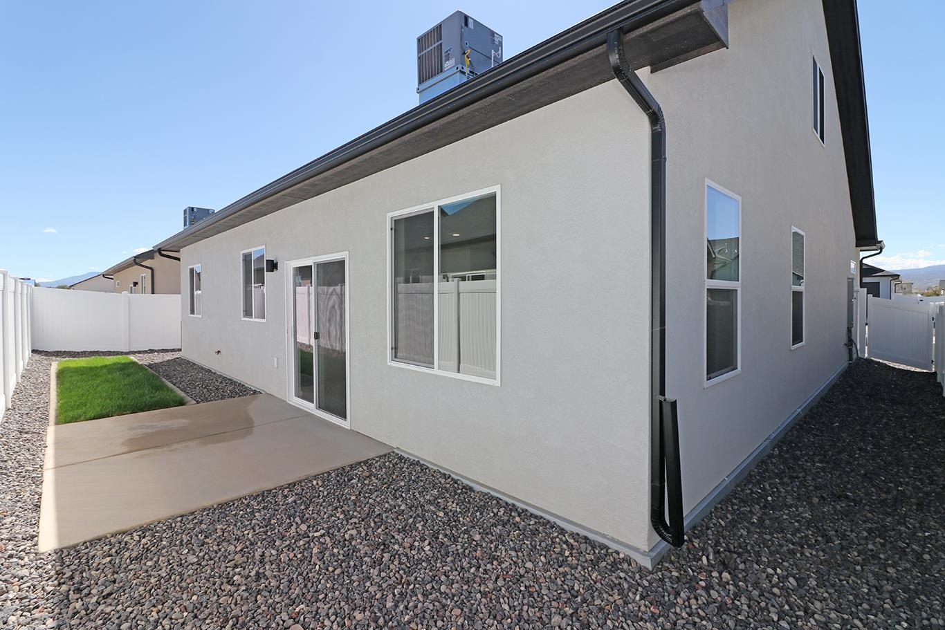 2450 Hamilton Road, Unit B Grand Junction, CO 81505 - Photo 26 of 29 a view of a house with a yard