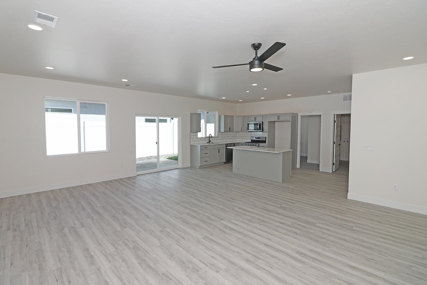 2450 Hamilton Road, Unit B Grand Junction, CO 81505 - Photo 5 of 29 a view of a kitchen with furniture and wooden floor
