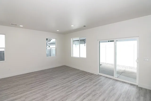 a view of kitchen with wooden floor