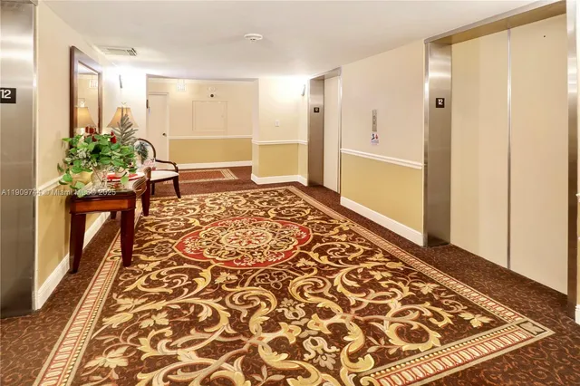 a view of front door with wooden floor