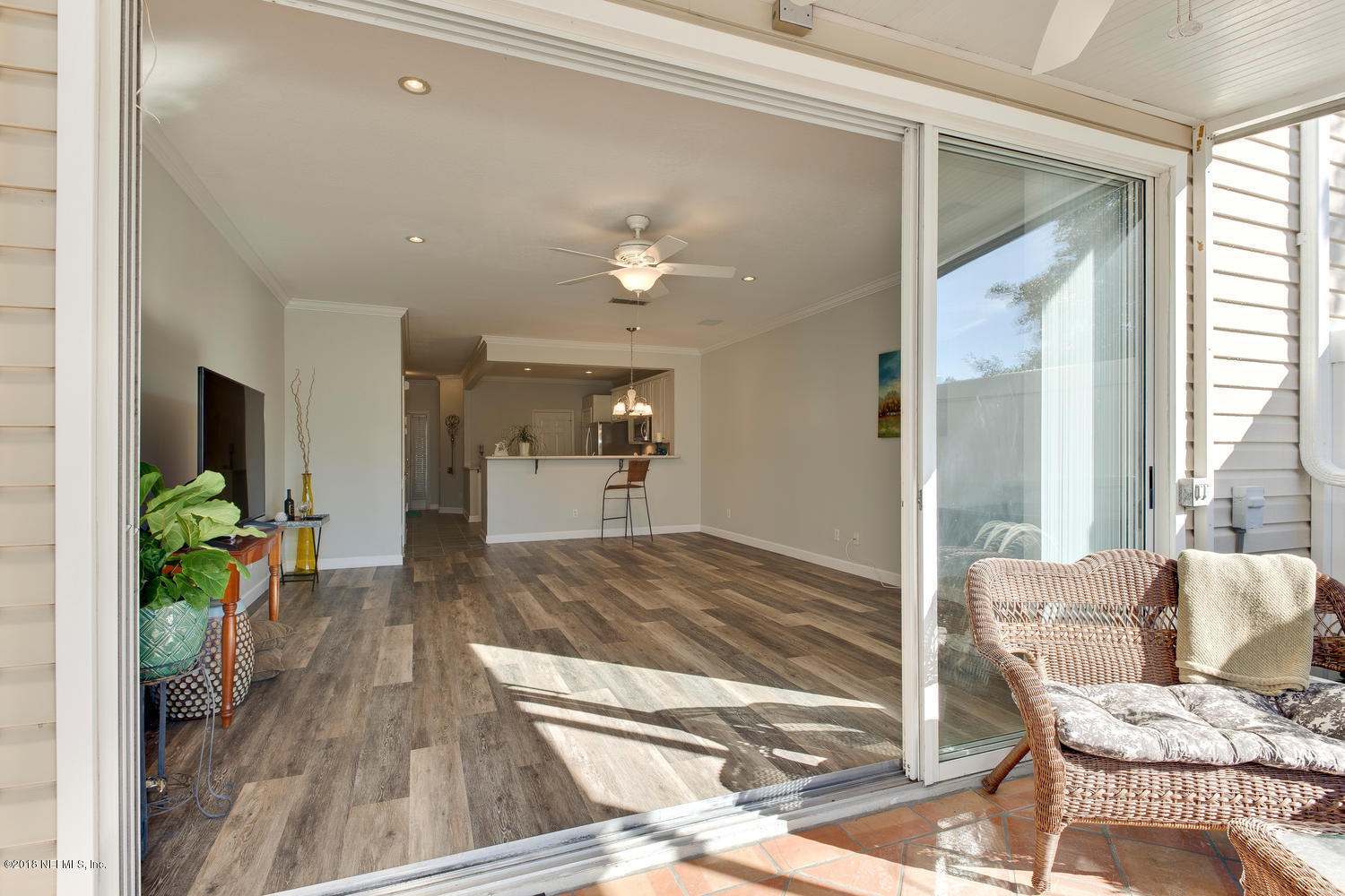 7990 Baymeadows Road, Unit 1406 Jacksonville, FL 32256 - Photo 13 of 48 Patio to Living Area